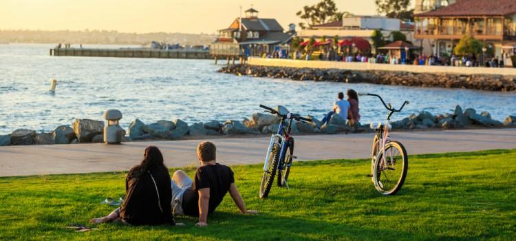 Two tourists enjoy a waterfront park in San Diego
